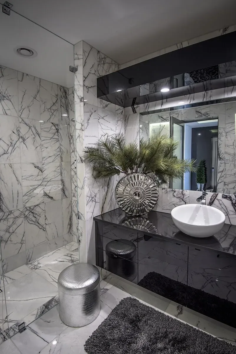 A Bathroom With a Sink, and Mirror — Designer Kitchens in Berrimah, NT