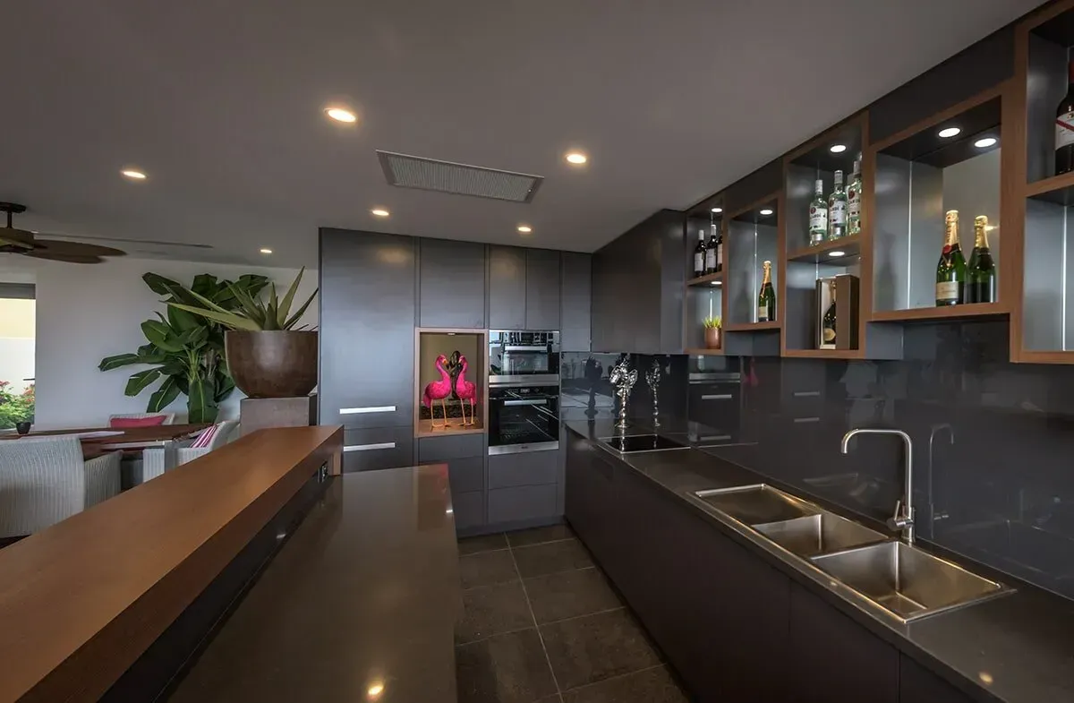 A Kitchen With Stainless Steel Appliances and a Sink — Designer Kitchens in Berrimah, NT