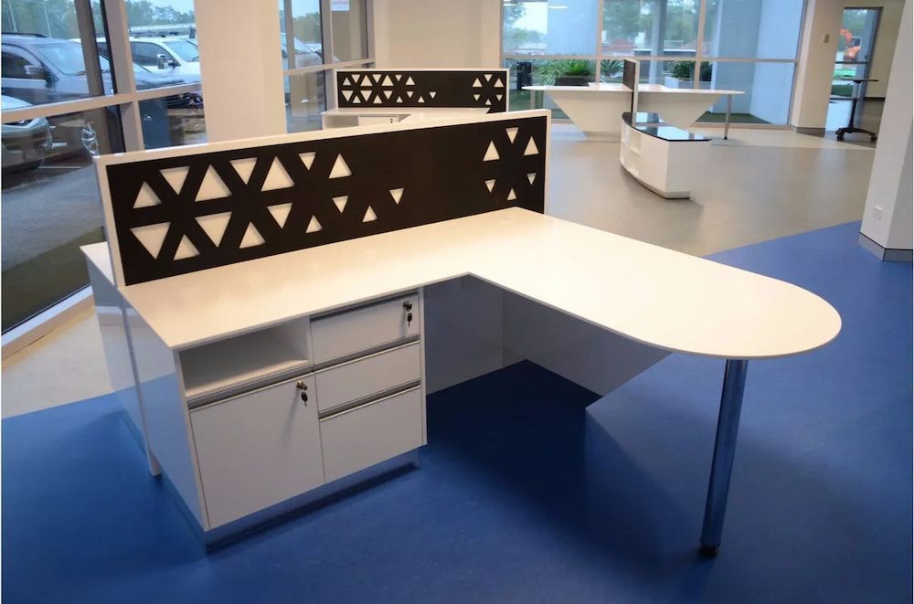 A White Desk With a Black Triangle Design on It — Designer Kitchens in Berrimah, NT