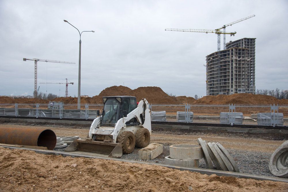 View White Bobcat Skid Steer Loader — Positrack & Bobcat Hire in Boomerang Beach, NSW