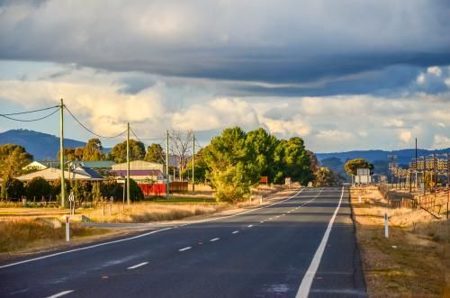 Road Going Through a Rural Area With a Cloudy Sky — Blind Outfitters in Redlynch, QLD