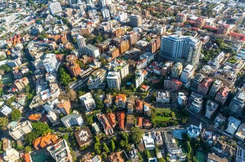 Aerial View of a City Filled With Lots of Buildings and Trees — Blind Outfitters in Bentley Park, QLD