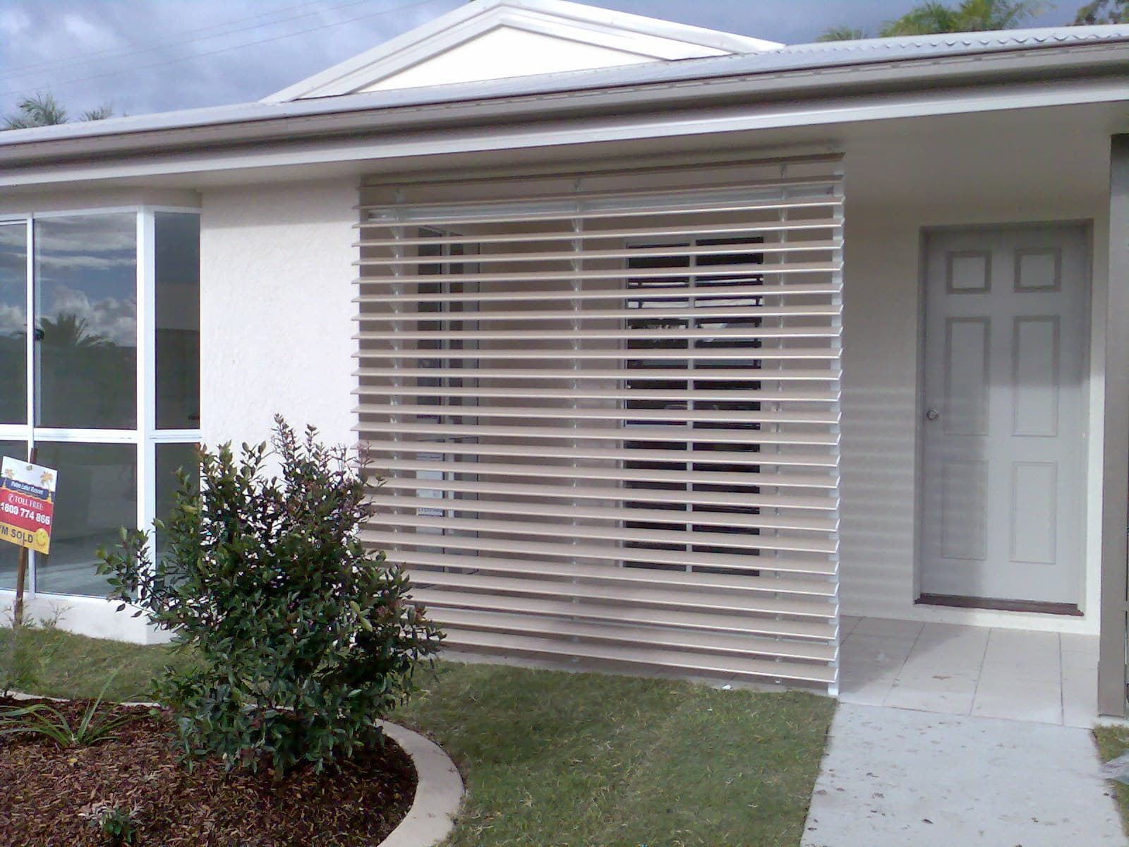 Front of House with louvers open  — Blind Outfitters in Atherton, QLD