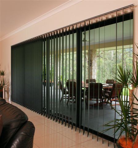 Open Vertical Blinds Showing Table Setting On Patio Outside — Blind Outfitters in Atherton, QLD