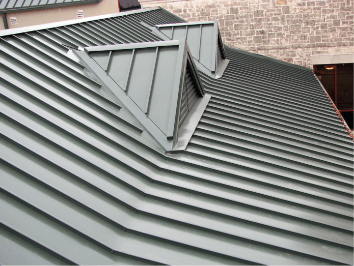 Roof with green metal roofing material