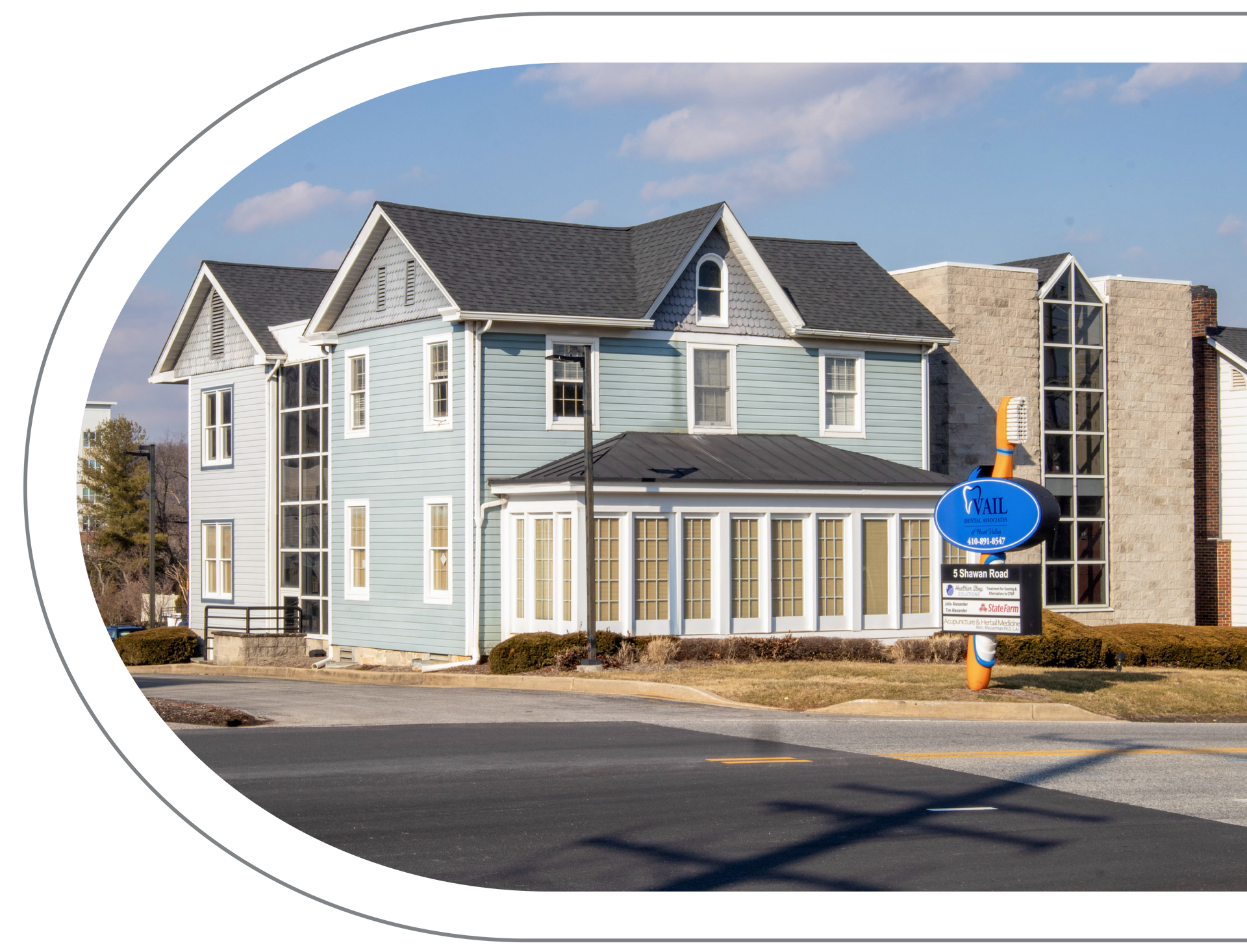 Vail Dental Associates in Hunt Valley, MD, 21030 office, which looks like a two-story blue house with glass-walled addition.