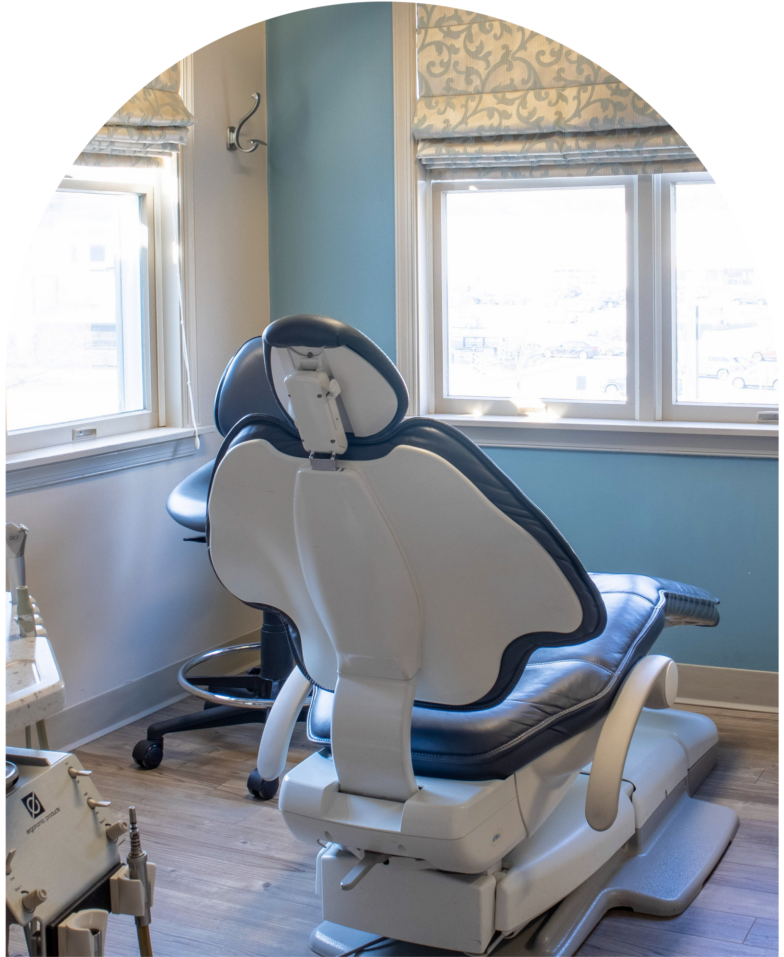 Woman reclined in a dentist chair, eyes closed in Hunt Valley, MD, 21030.