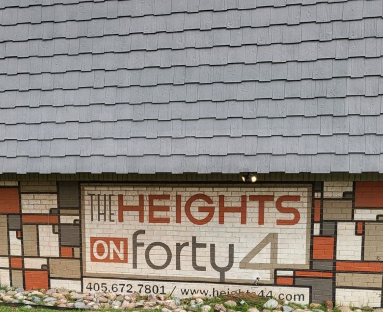 Apartment community sign on wall