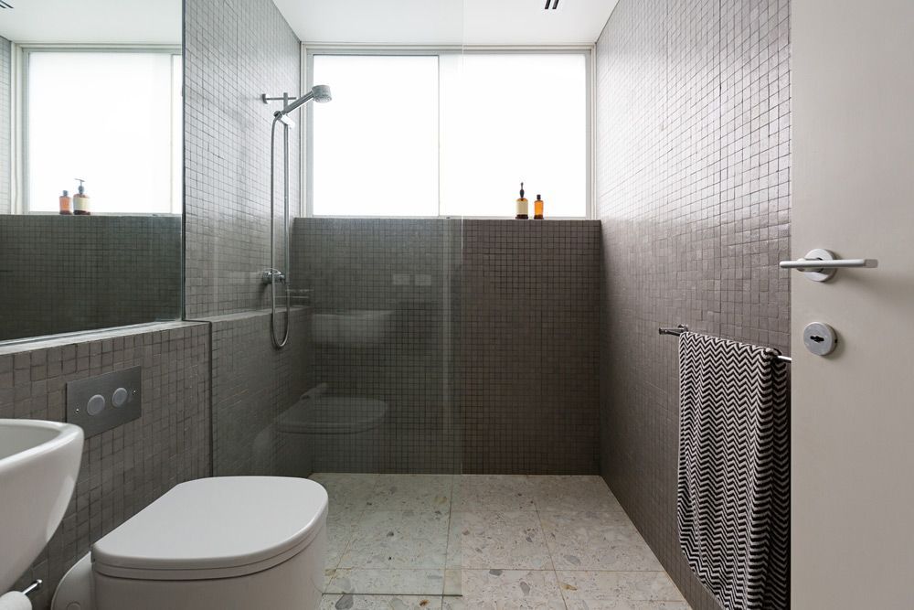 Modern Walk in Shower With Mosaic Full Height Tiles and Terrazzo Floor — Carl Whelan Building & Renovations In Narara, NSW