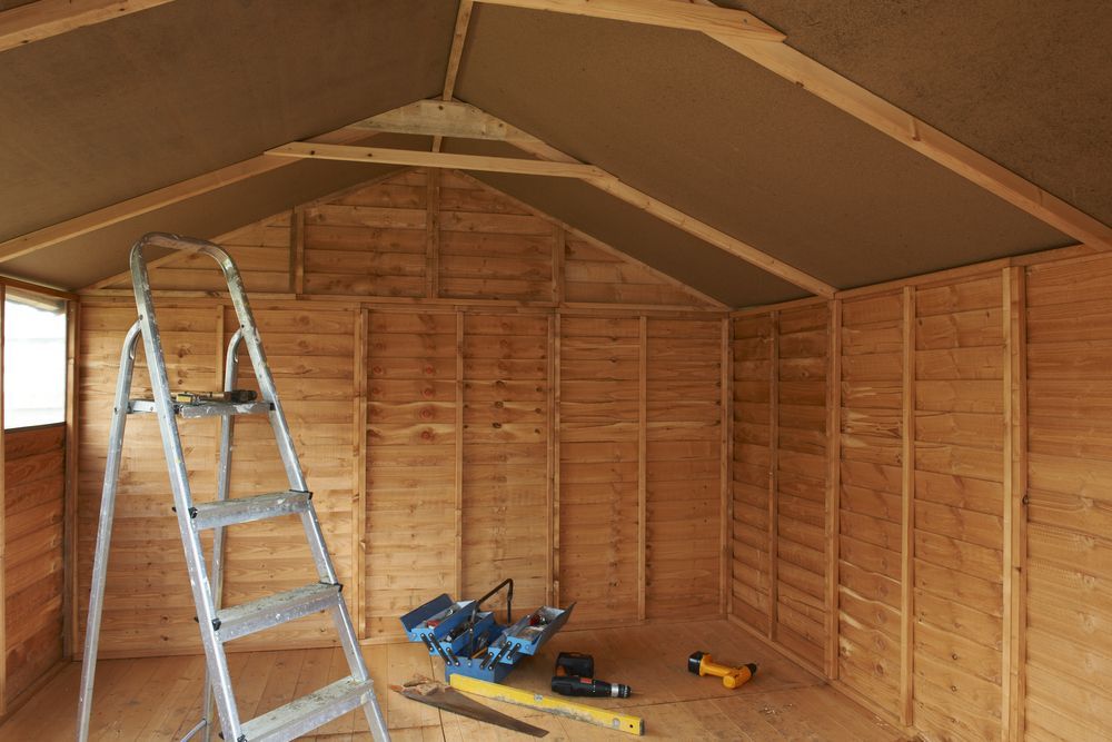 Interior of a Wooden Shed Under Construction With a Ladder — Carl Whelan Building & Renovations In Woy Woy, NSW