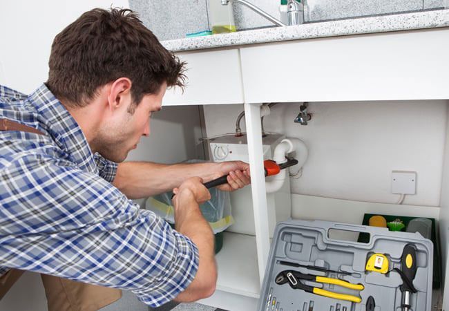 fixing a wash room sink