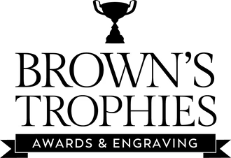 Brown’s Trophies logo with black trophy icon and “Awards & Engraving” banner