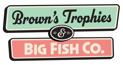 Brown’s Trophies logo with black trophy icon and “Awards & Engraving” banner