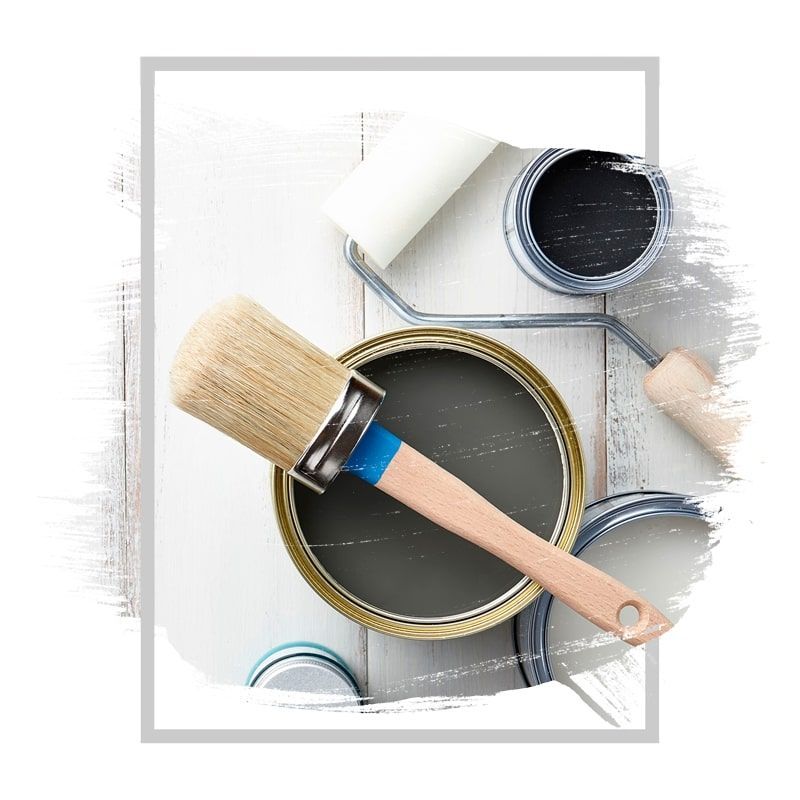 Paint supplies: open paint can with brush, paint roller, and additional paint cans.