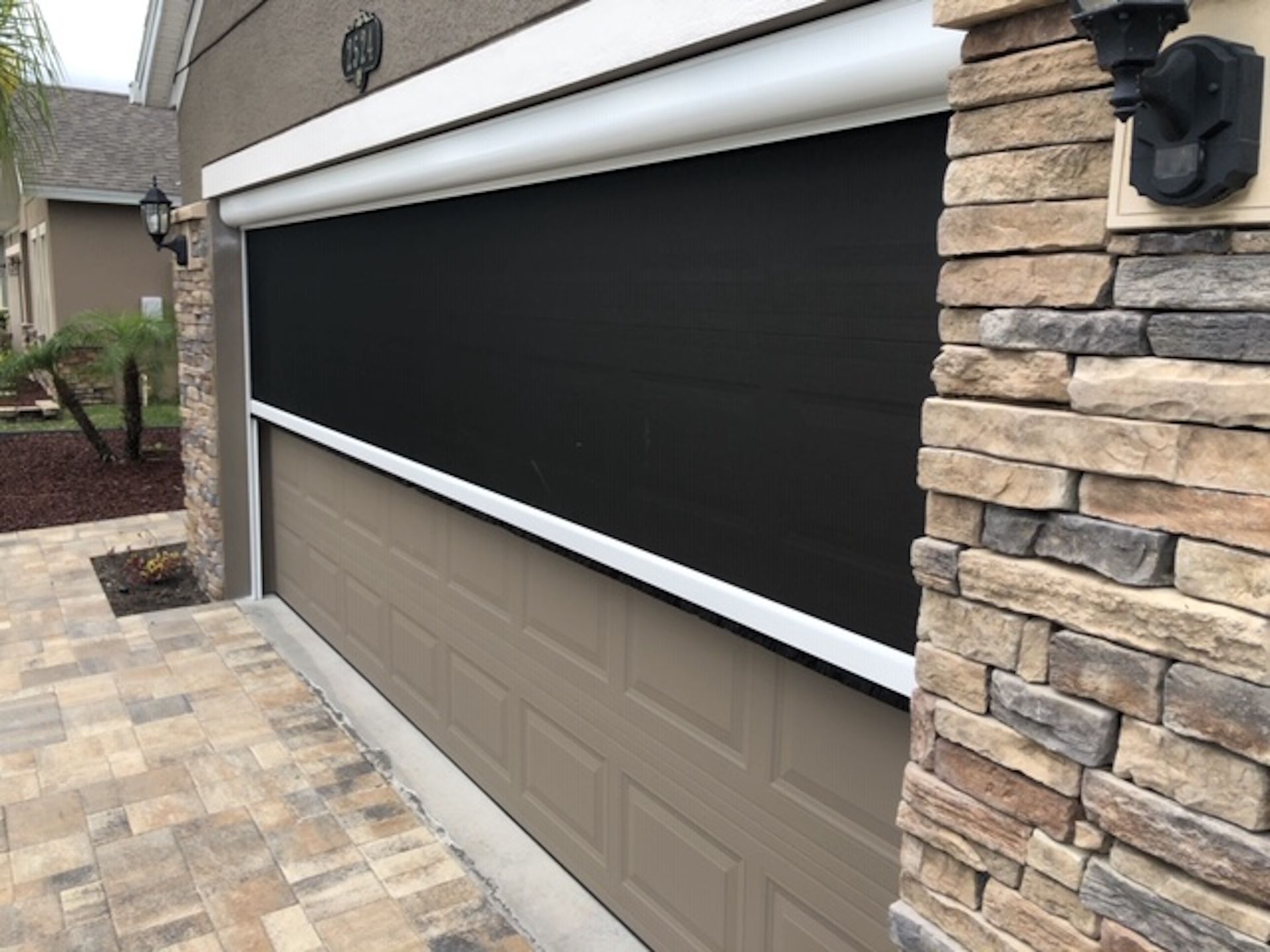 Garage motorized screen enclosure - Melbourne, FL