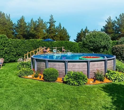 Round above ground pool with landscaped deck in a Melbourne, Florida backyard used for year-round swimming on the Space Coast