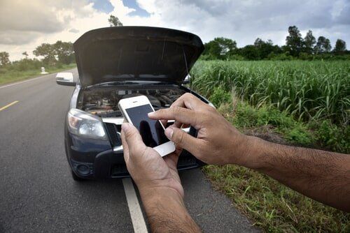 Driver Calling a Mobile Mechanic After Breaking Down on a Rural Road — BITR Enterprises in Berkeley, NSW