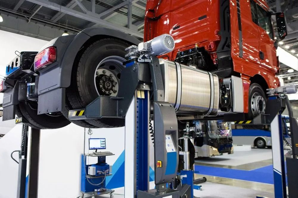 Mechanic Repairing Truck Wheel In Illawarra