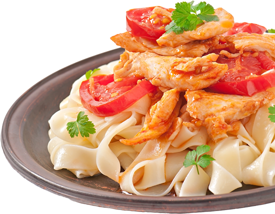 Pasta with chicken and tomatoes on a gray plate, garnished with parsley.