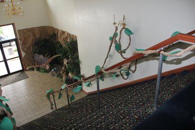 VBS decoration of stairway with vines