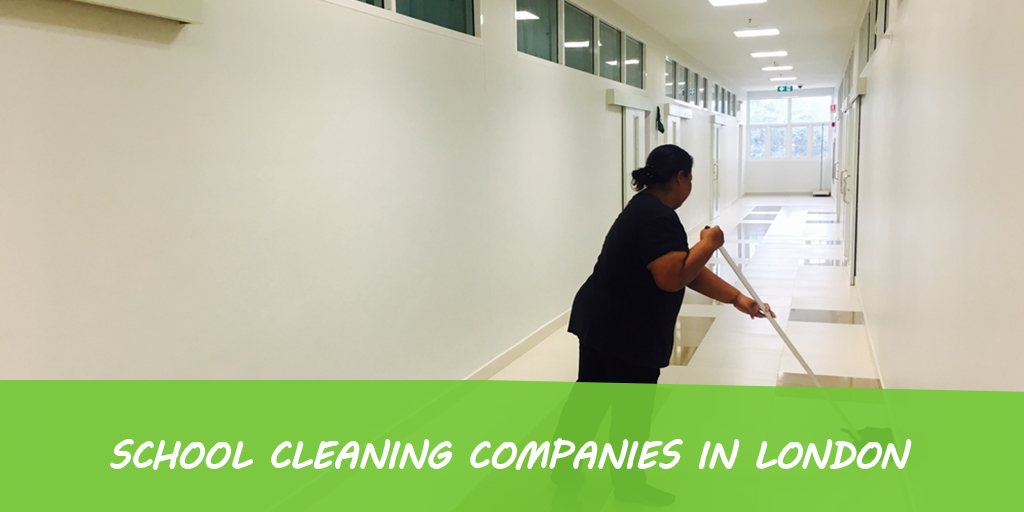 A woman is cleaning a hallway with a mop.