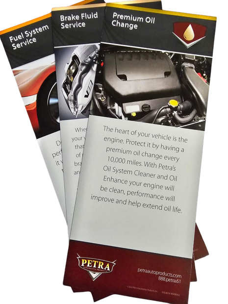 Three pamphlets are stacked on top of each other on a white background.