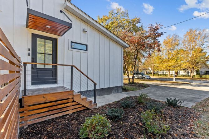 side of a house with wooden steps