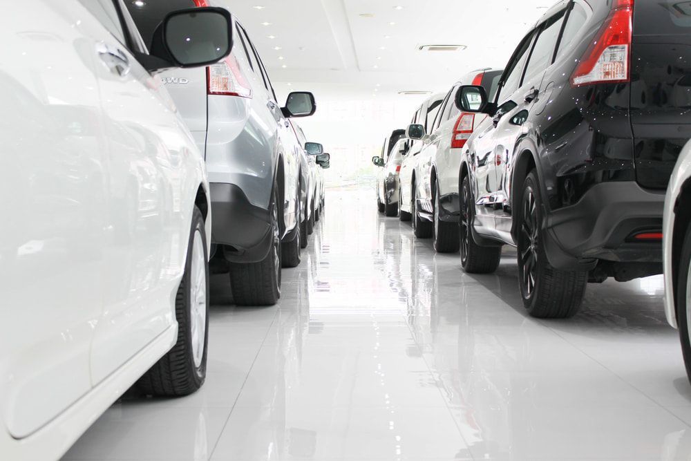 A Row of Cars is Parked in a Showroom — Al's Panel Shop in Berrimah, NT