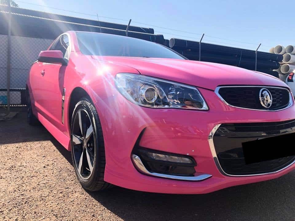 Pink Holden Commodore Car Parked Outside on A Sunny Day — Al's Panel Shop in Berrimah, NT