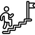 A man is climbing up a set of stairs to a flag.