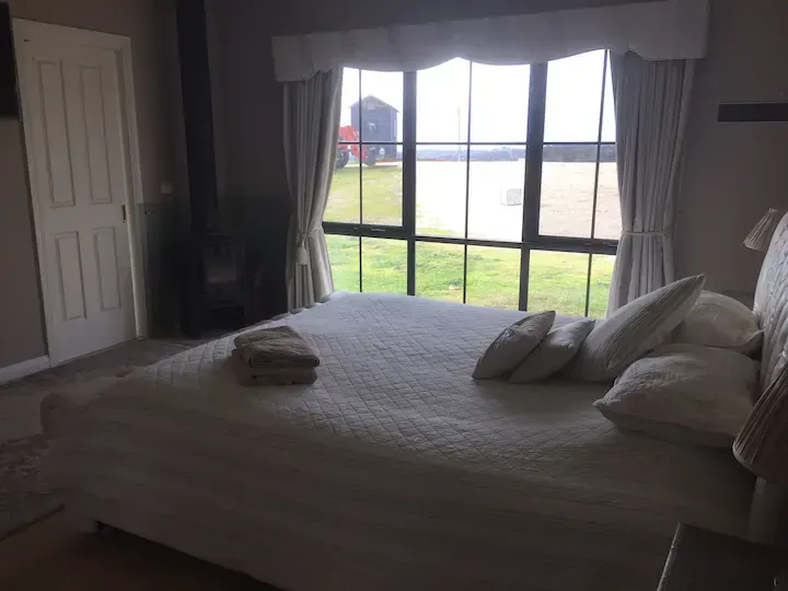 Queen bed in farm house