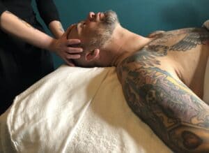 Courtney Maguire, best known as @browconfidant, getting ready to perform facial massage on a guest at Sanctuary.