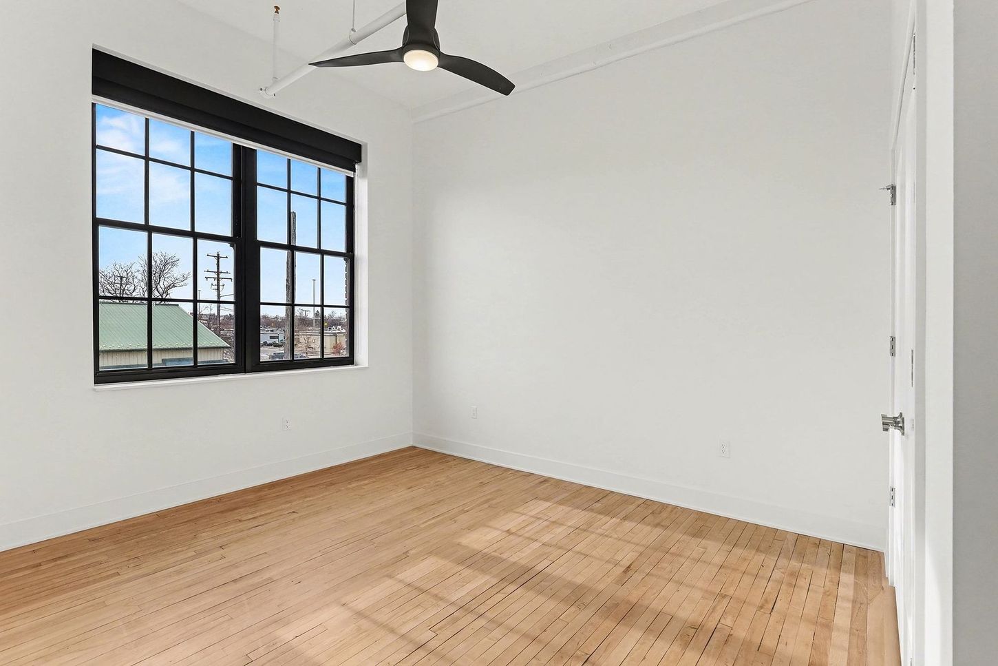 One Bedroom with wood flooring