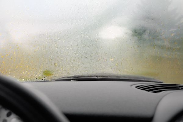 Foggy view through a car windshield with dashboard visible in the foreground | Dub's Garage