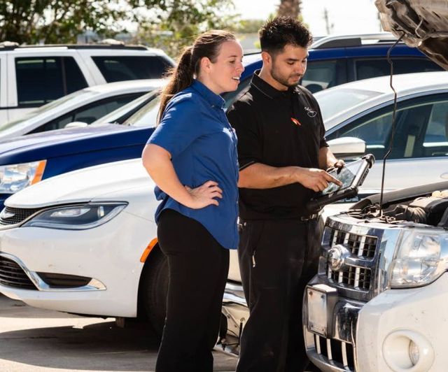Our mechanics inspect a white SUV in Corpus Christi, TX | Dub's Garage
