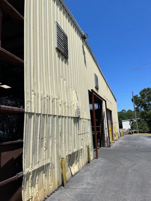 England Bros damaged wall before — Largo, FL — England Bros Construction