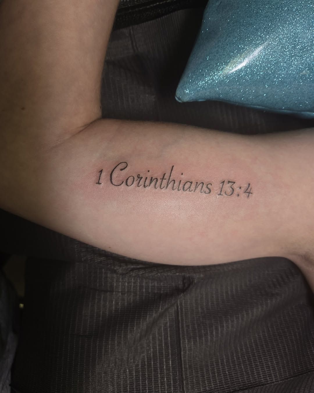 Tattoo on arm reads 
