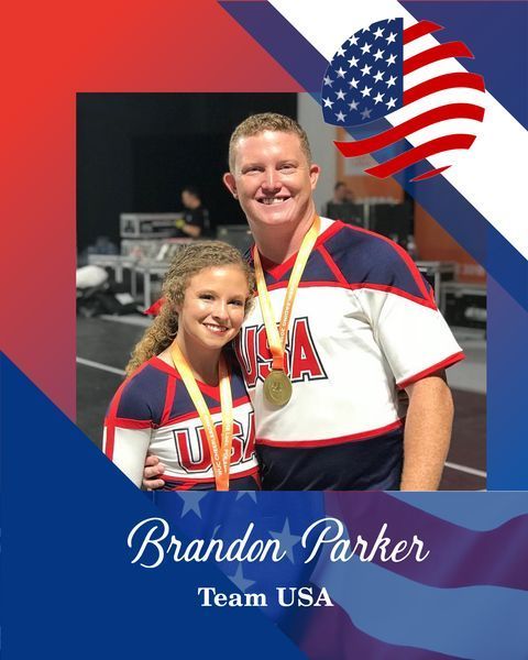Brandon Parker and a teammate in Team USA uniforms with medals, over a red, white, and blue patriotic background