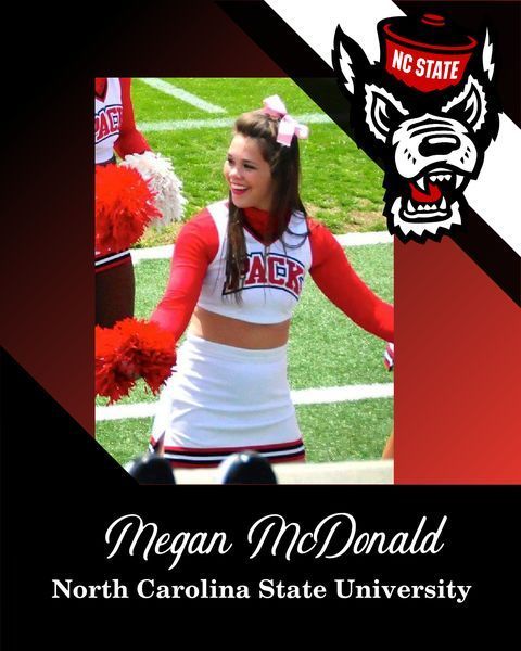 North Carolina State University cheerleader Megan McDonald in red and white uniform, with Wolfpack logo and field background