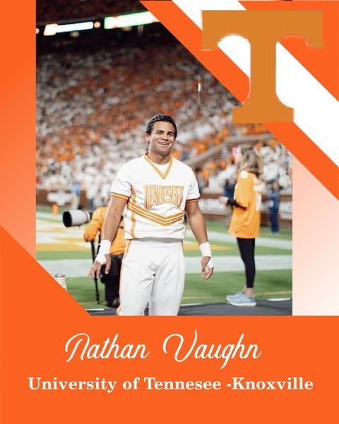 Nathan Vaughn on a football field at University of Tennessee-Knoxville, wearing white and orange, smiling