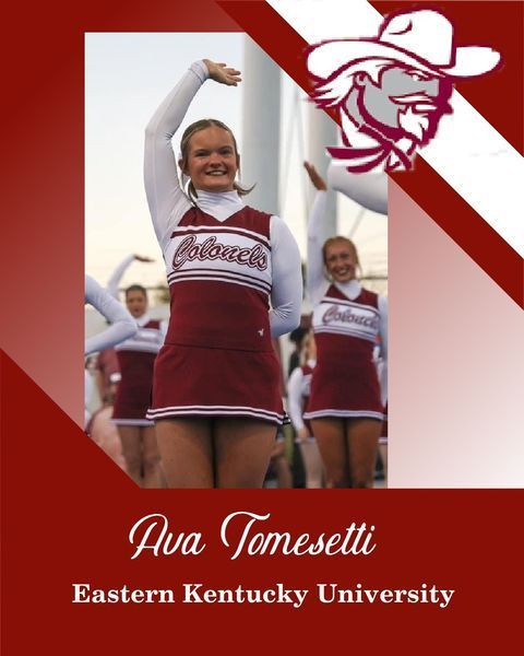 Eastern Kentucky University cheerleader Ava Tomesetti in maroon and white uniform posing on the field