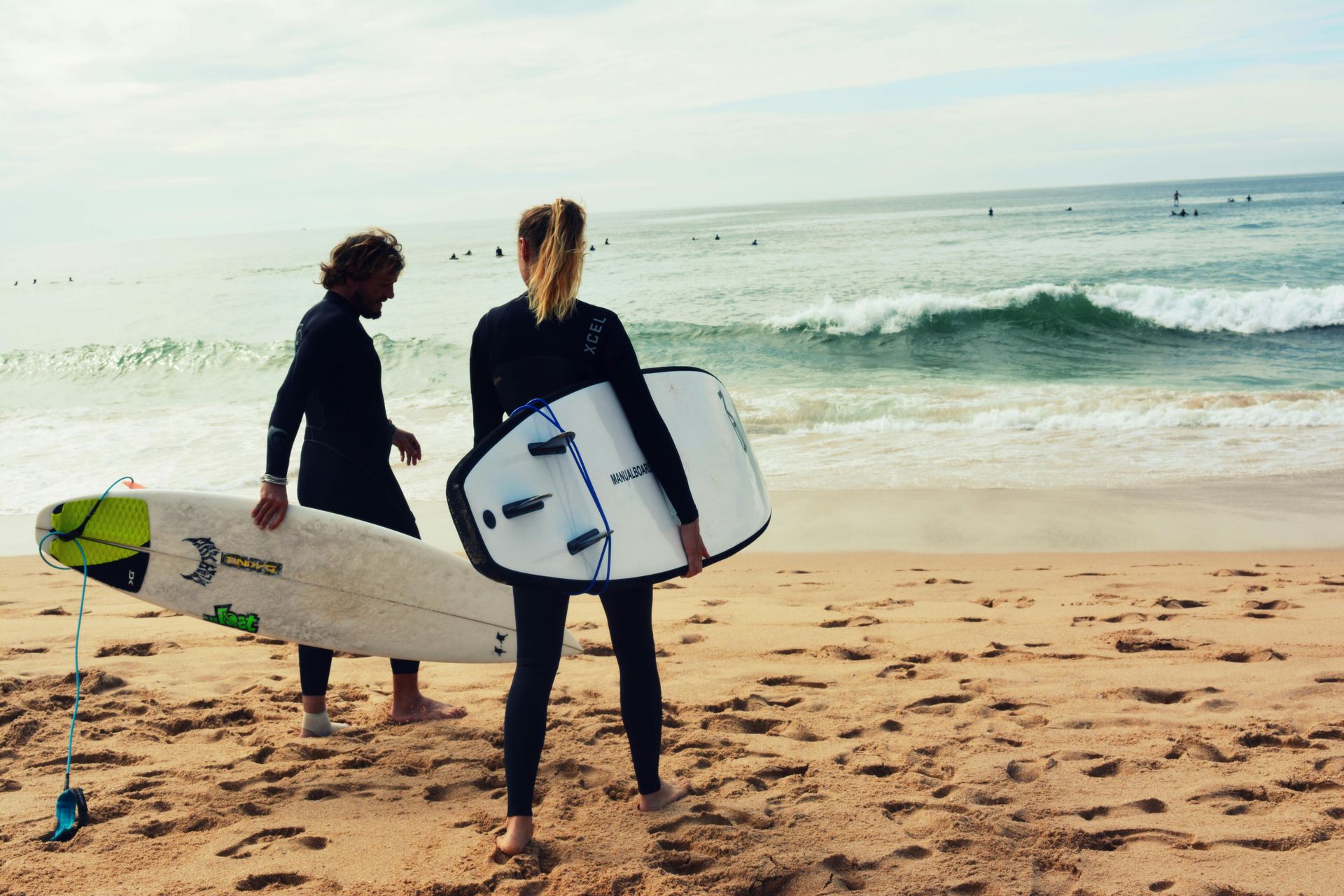 two surfers