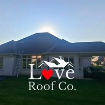 Love Roof Co. logo over a house roof at sunset, with a red heart in the word “Love”