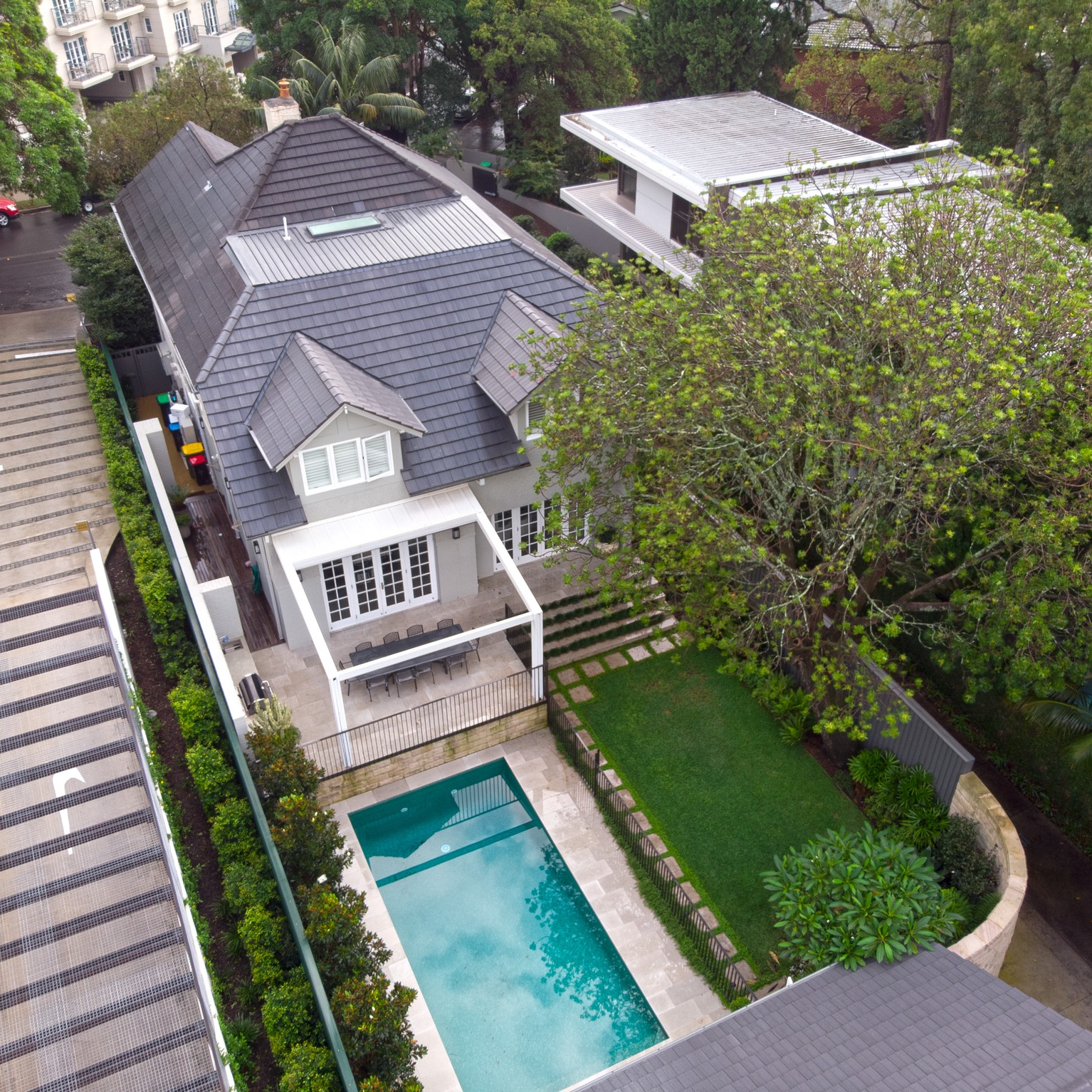 Modern Two-story House With a Balcony and Sliding Glass Doors — Burmah Constructions in Illawarra, NSW