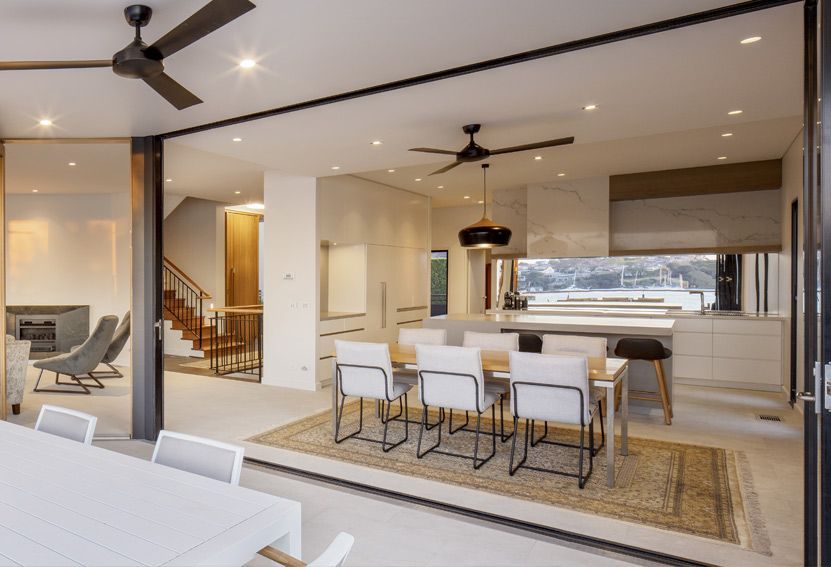 Modern Dining Room With Open Kitchen, Sliding Glass Doors — Burmah Constructions In Kangaroo Valley, NSW