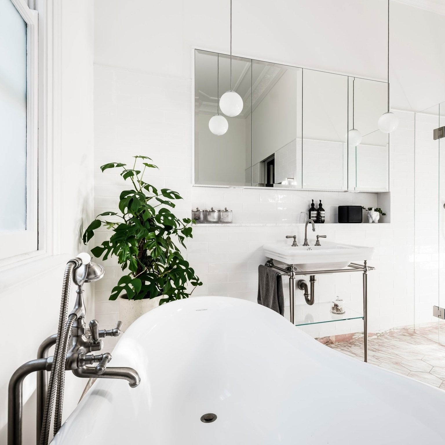 Elegant White Bathroom With a Freestanding Bathtub — Burmah Constructions In Kangaroo Valley, NSW