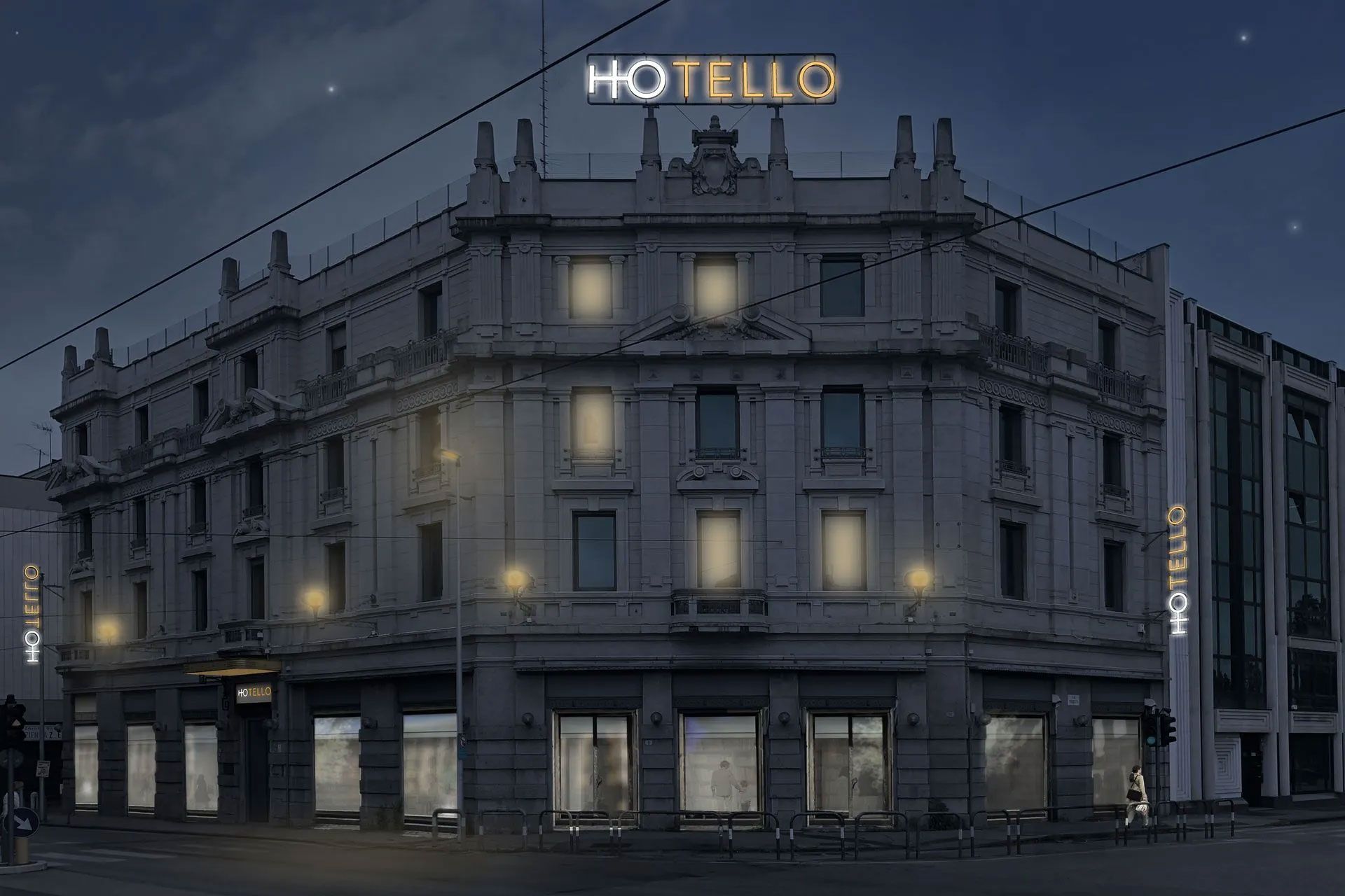 Un grande edificio con la parola hotello in cima