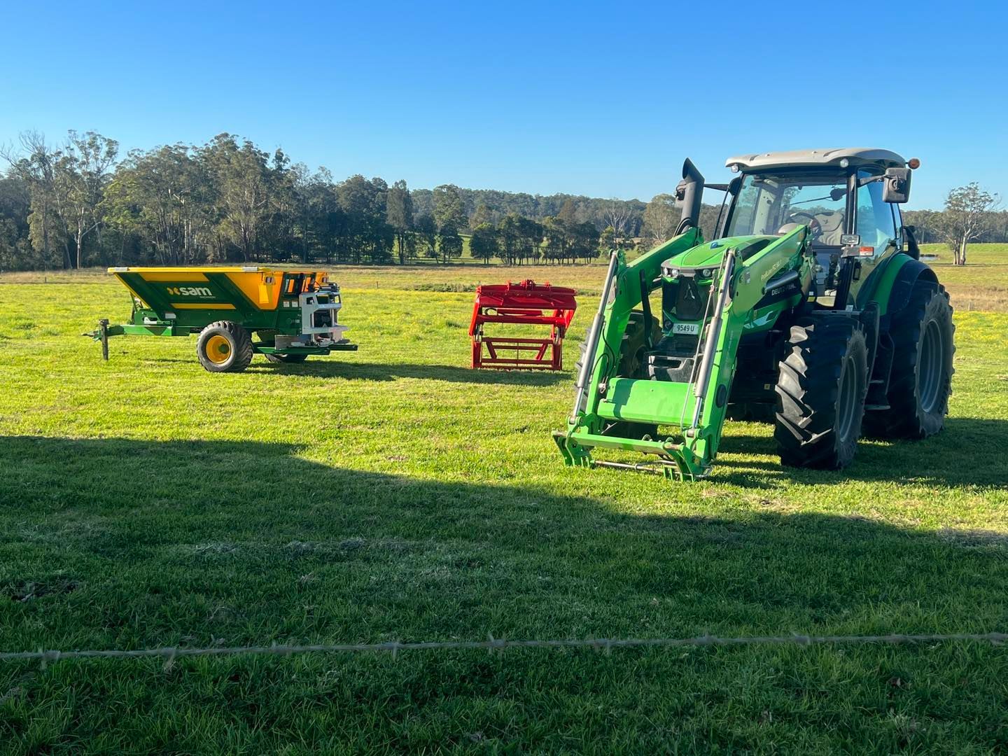 Tractor at Work in Agricultural Field: Efficient Farm Machinery — Thompson's Farm Gear In Taree, NSW
