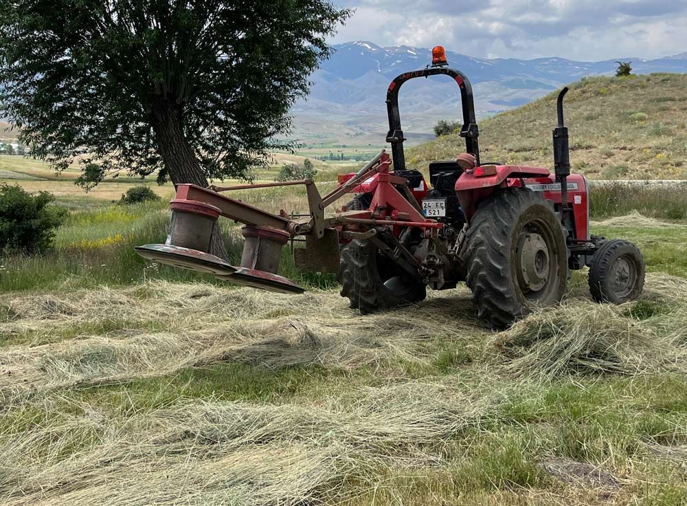 Back of the tractor with hay bale cutting machine — Thompson's Farm Gear In Port Macquarie, NSW