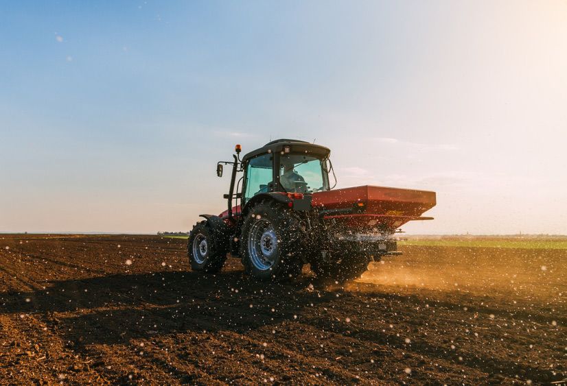 Farmer Applying Nitrogen Fertilizer to the Land — Thompson's Farm Gear In Port Macquarie, NSW
